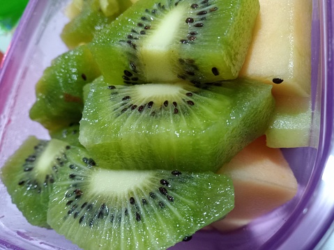 chopped kiwi fruit and melon