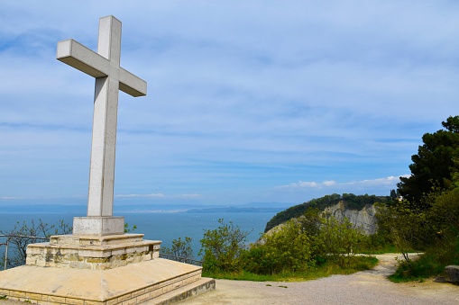 View of a cross in Strunjan nature reserve and the Adriatic sea in Primorska, Slovenia