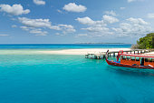 Turquoise sea, white beaches and boat