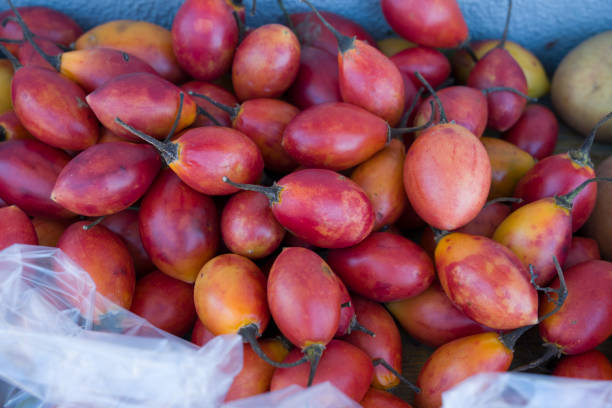 Madeira island Portugal outlook in the North of the island. Cyphomandra betacea fruits for sale. Solanum betaceum.