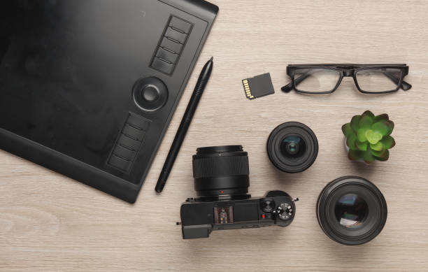 istock Camera and photographic accessories on the table. Top view 2148043093