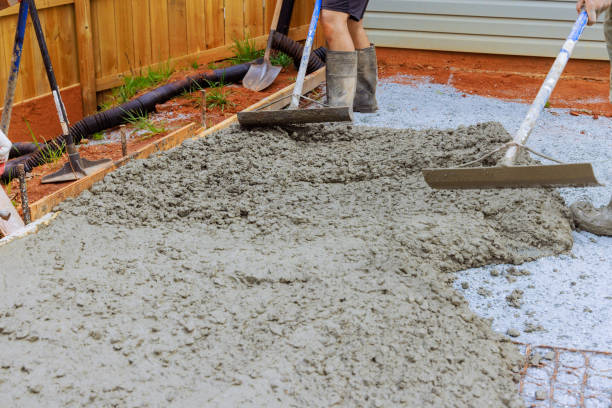 istock Use of special tools by a construction worker in leveling concrete 2148044384
