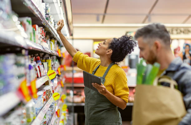 istock Retail Expertise in Action at a Grocery Store 2148044580