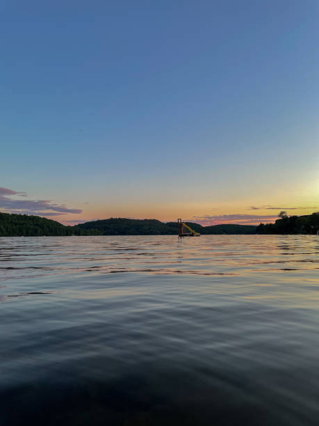 istock Beautiful sunset over a calm lake 2148046027