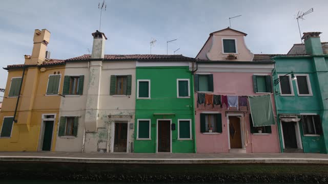 Colorful Burano Canal Houses with Hanging Laundry