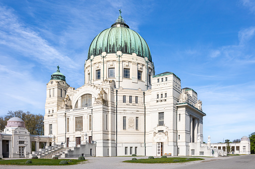 Art Nouveau St. Charles Borromeo Church at Vienna Central Cemetery with blue sky for copy space