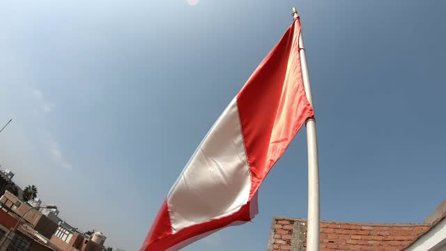 Peruvian Flag 4K. 30 fps . Peruvian flag waving in the wind.