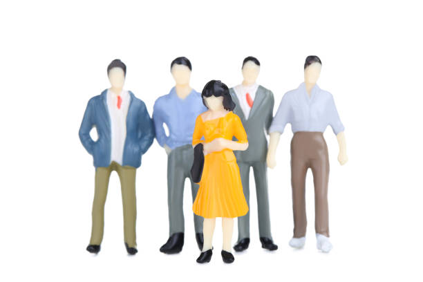 istock Miniature people isolated on white background 2148047922