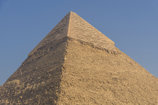 Khephren pyramid with no people under the blue sky of a sunny summer day, copy space