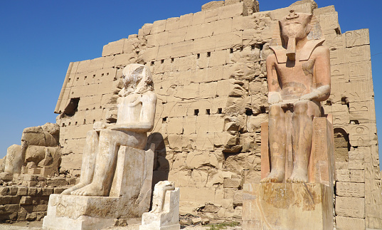 Karnak Temple in Egypt. Monumental Pharaoh Thutmose II Statues.