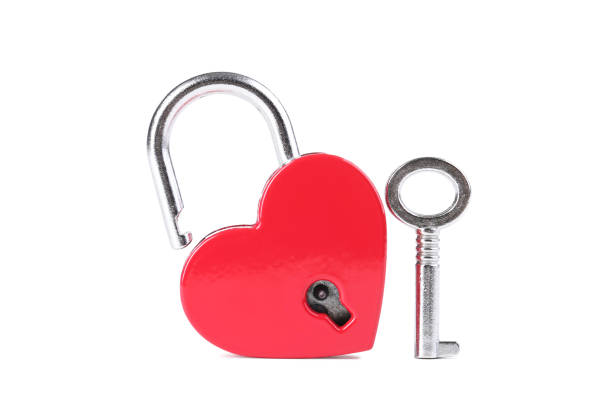 istock Valentine heart shaped padlock with key isolated on white background 2148051694