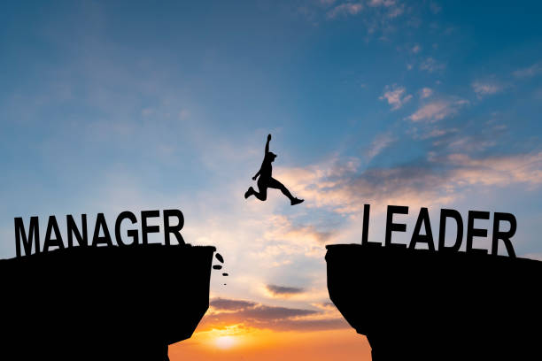 istock Silhouette Man jumping from Manager cliff to leader cliff on cloud and blue sky. Change behaviour and mindset to Leadership concept 2148052386