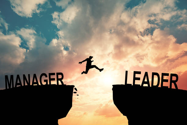 istock Silhouette Man jumping from Manager cliff to leader cliff on cloud and blue sky. Change behaviour and mindset to Leadership concept 2148052397