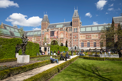 Amsterdam, Netherlands, April 7, 2024; People enjoy the beautiful spring weather in the gardens of the Rijksmuseum in Amsterdam.