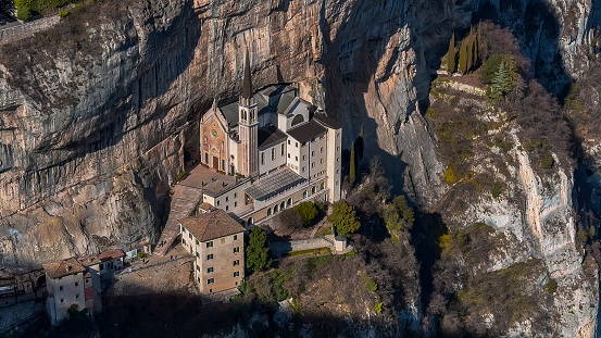 Medieval church Santuario Basilica Madonna della Corona on the cliffs Verona, Italy.