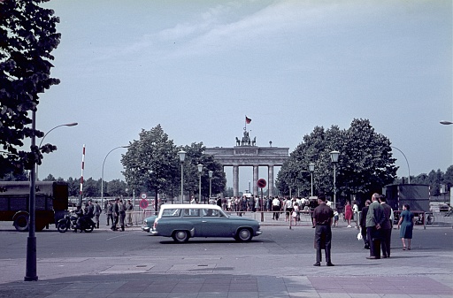 Berlin (East), GDR, Germany, 1968. View of Pariser Platz with the Brandenburg Gate from the East Berlin side. Furthermore: tourists, border soldiers and vehicles.