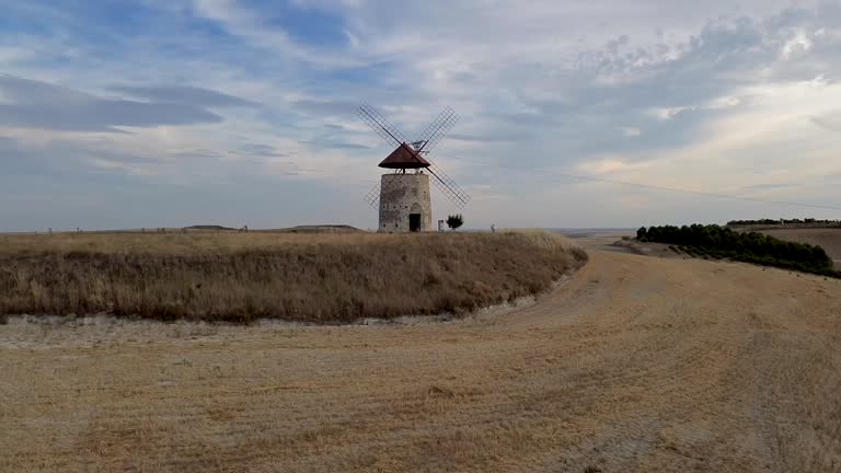 Castellan windmill in cultivated fields