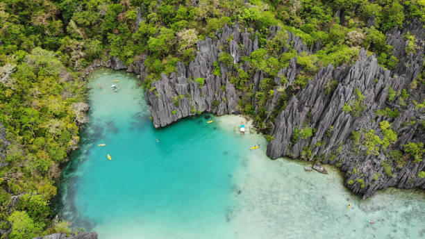 istock Karst mountains aerial view and blue lagoon 2148057142