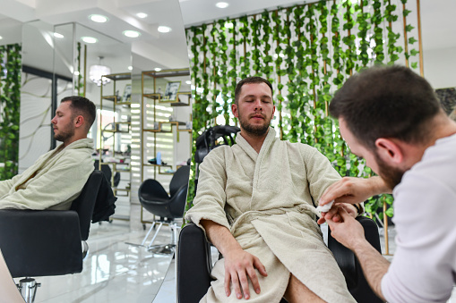Manicure Time For Metrosexual Male By Beautician