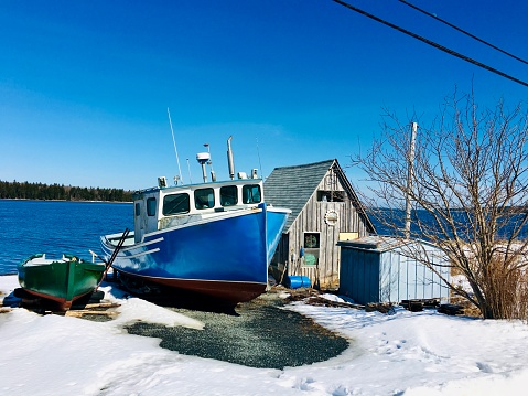 A Rose Bay fishing boat in March before Hurricane Dorian hit with winds of up to 220 mph and storm surges of up to 23 feet. It was one of the most powerful Atlantic hurricanes to make landfall. The fishing boat, rowing boat and shed were washed away by the hurricane on September 7, 2019.