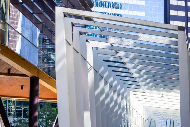 istock Closeup pedestrian bridge with modern office buildings, background with copy space 2148065121