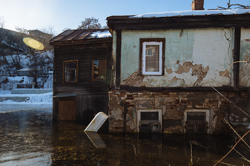Flooded rural house. Concept of disaster.