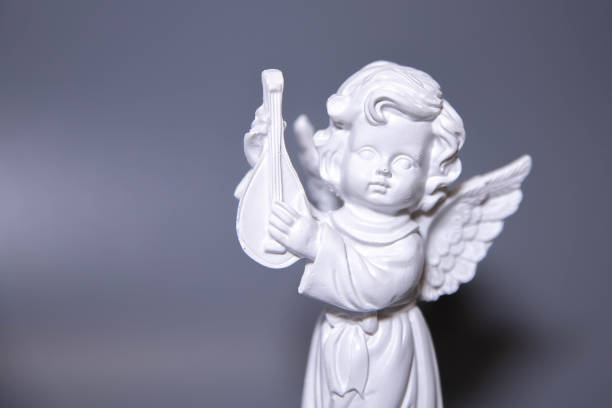 istock Angel statues isolated on white background. 2148068465