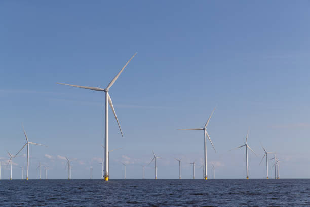 istock Windturbines in the water, producing alternative geen energy. 2148068977