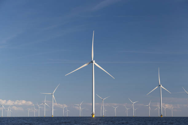 istock Windturbines in the water, producing alternative geen energy. 2148068992