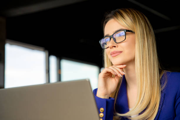 istock Focused Businesswoman with Eyeglasses 2148069679