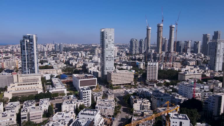 David Bloch street in Tel Aviv Israel with skyscraper high rises soaring above apatments