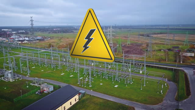 Caution graphic for electrical shock over a power substation - aerial orbit