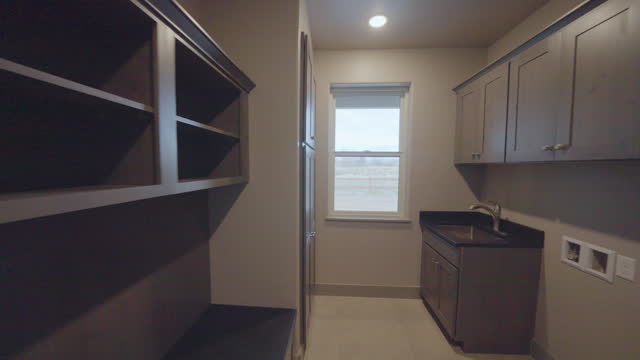Large Empty Laundry Room in a New Executive Home in Fruita Colorado