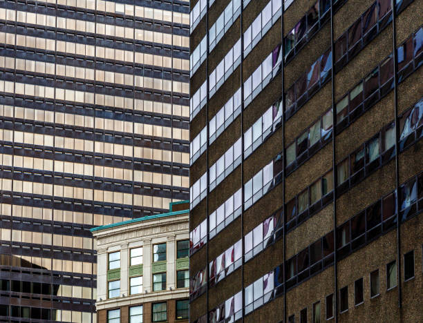 Boston, Massachusetts, USA - April 7, 2024: Contrasting architectural styles of downtown Boston buildings.
