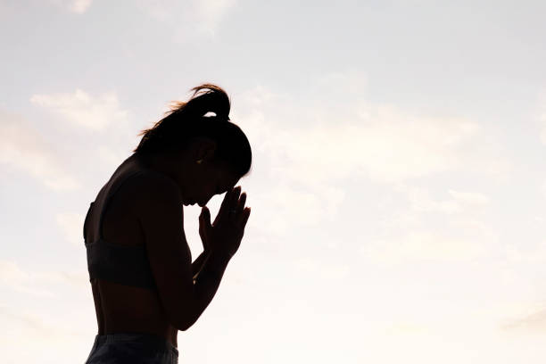 istock woman practicing yoga in pray position 2148072266