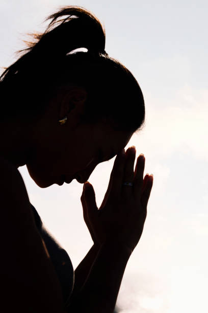 istock woman practicing yoga in pray position 2148072268