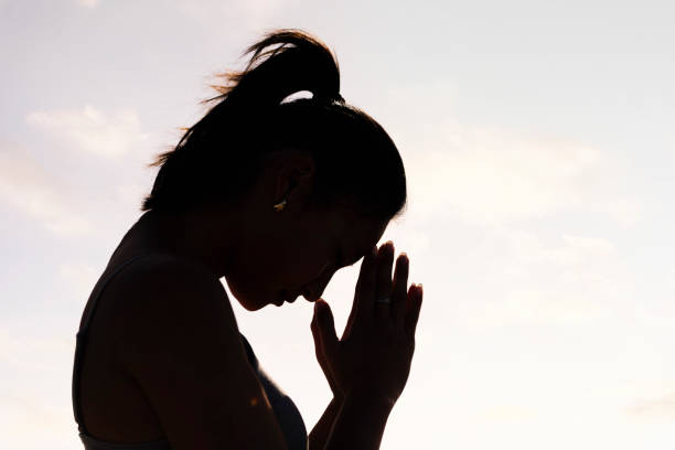 istock woman practicing yoga in pray position 2148072270