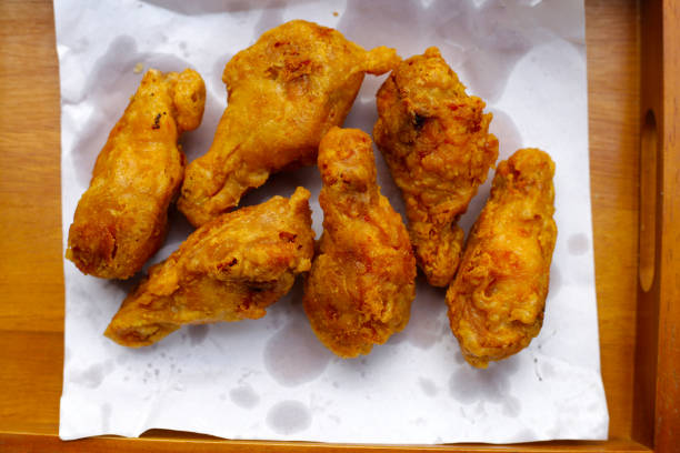 Fried chicken on wooden tray