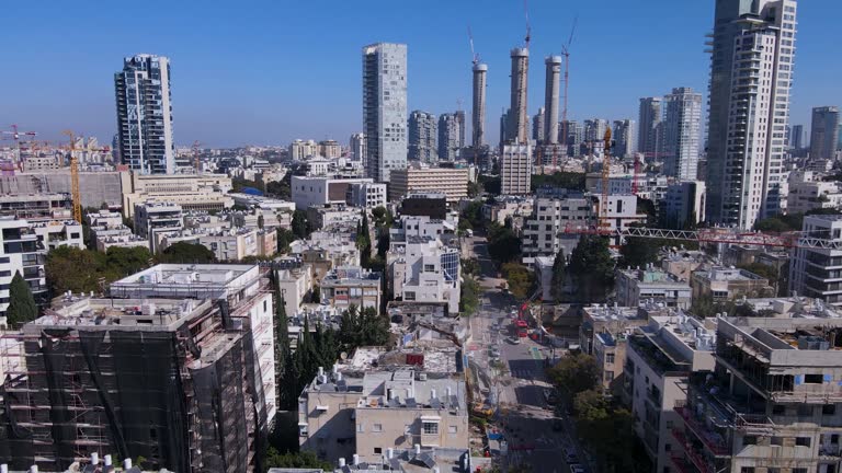 David Bloch Street in Tel Aviv Israel, aerial pullback ascend above construction