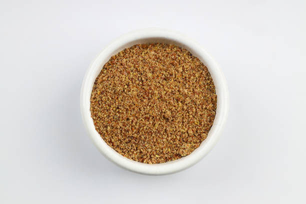 istock Pile of flax seeds isolated on white background 2148076002