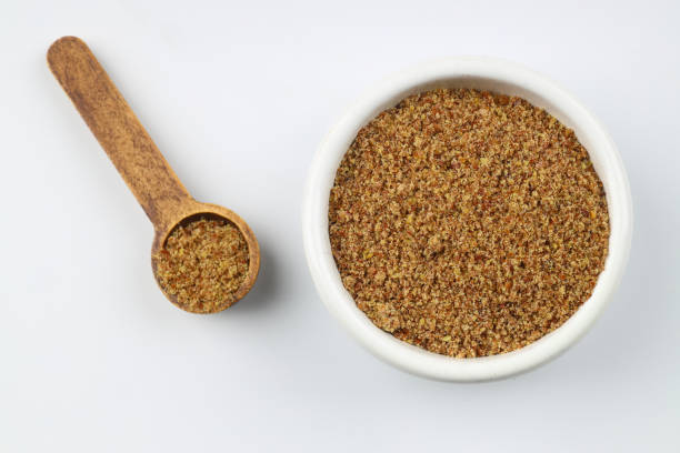 istock Pile of flax seeds isolated on white background 2148076003