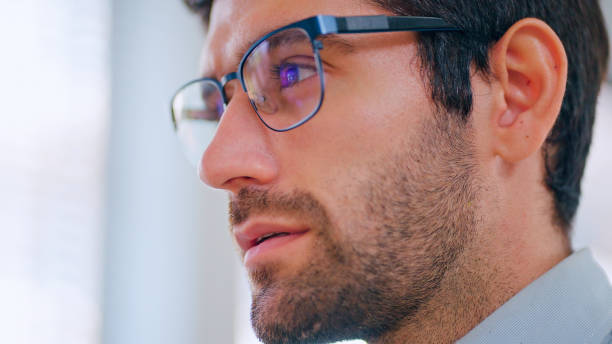 Contemplative businessman at the office.