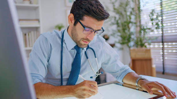 istock Doctor working in clinic office. 2148076609