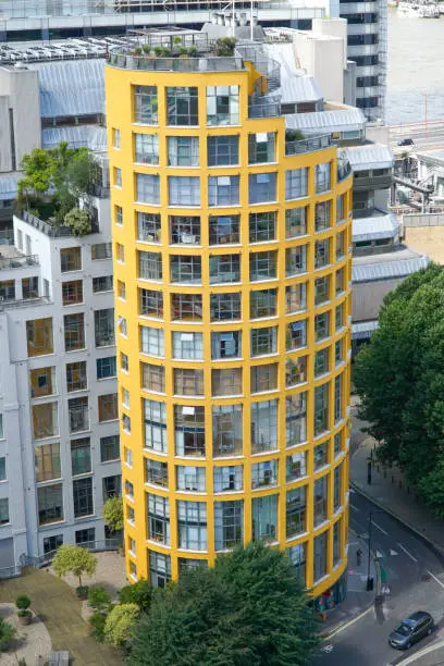 Round yellow Bankside Lofts building in London, England, on Hopton Street