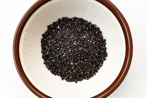 black sesame seeds in mortar
