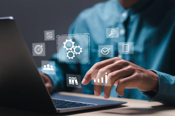 istock Businessman use laptop with operations management technology related to business processes and workflows, high performance, monitoring and evaluation. Automation concept. 2148081977