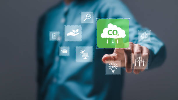 istock Reduce CO2 emissions concept. Person touch virtual carbon reduction icons for climate change to limit global warming and sustainable development and green business. 2148081997