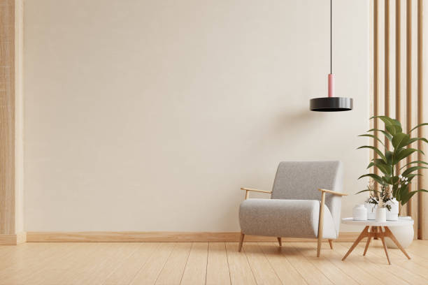 istock Modern minimalist interior with an armchair on empty warm cream color wall background- 3D rendering 2148085116