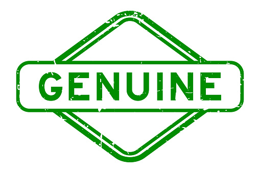 Grunge green genuine word rubber seal stamp on white background