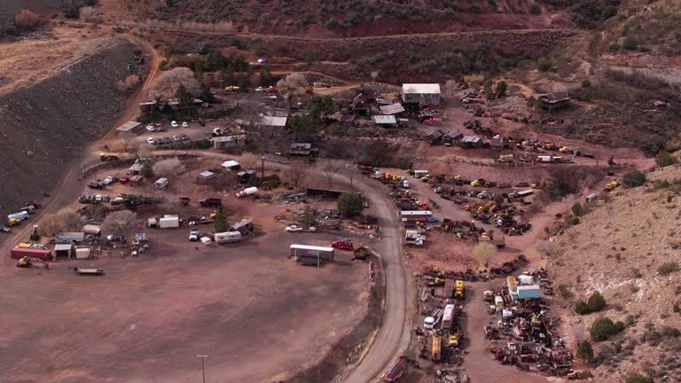 Aerial View of Jerome Ghost Town, Abandoned Mine Buildings and Vehicles, Arizona USA